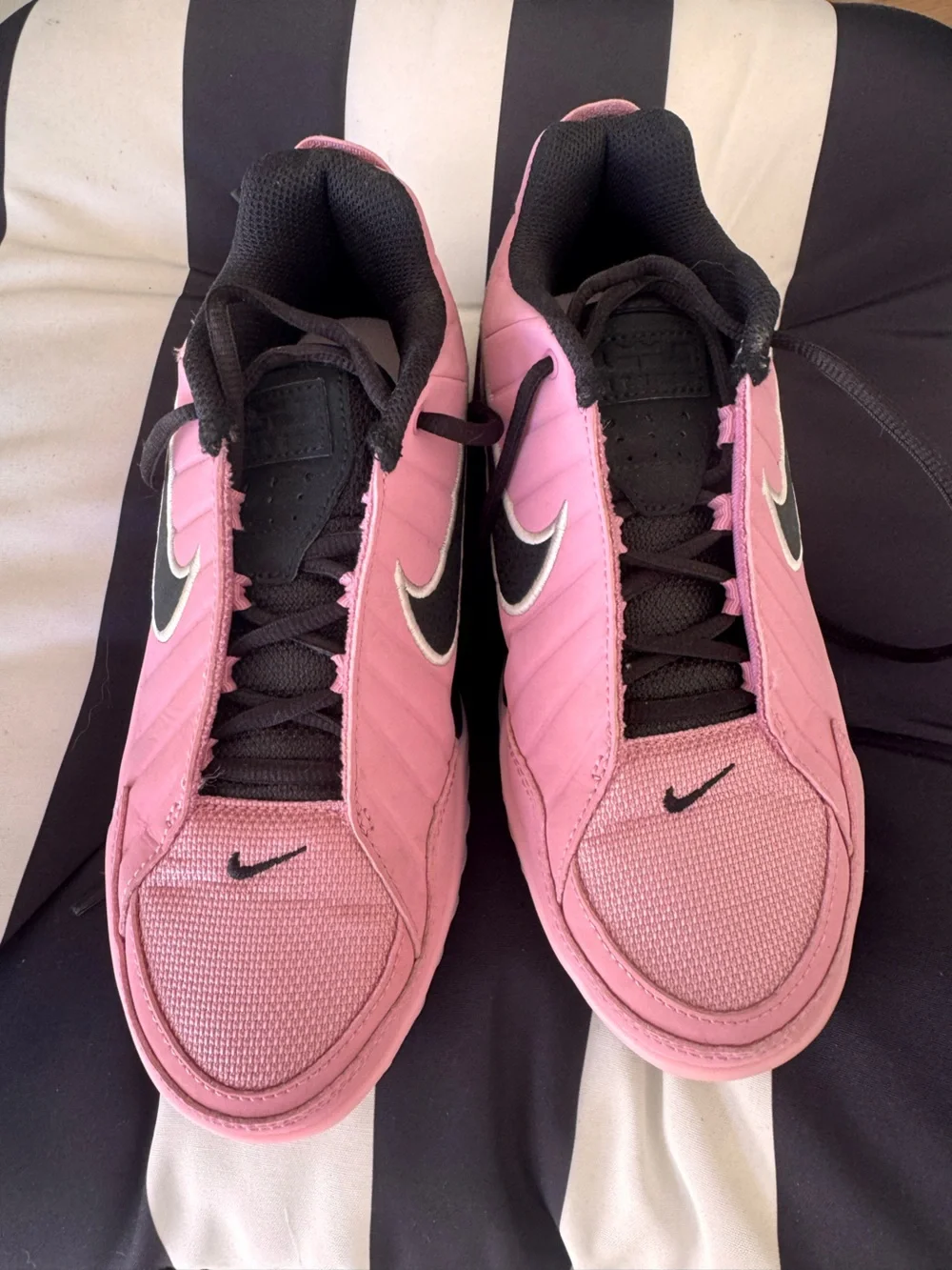 Nike Pink and Black basketball sneaker with White Swoosh
